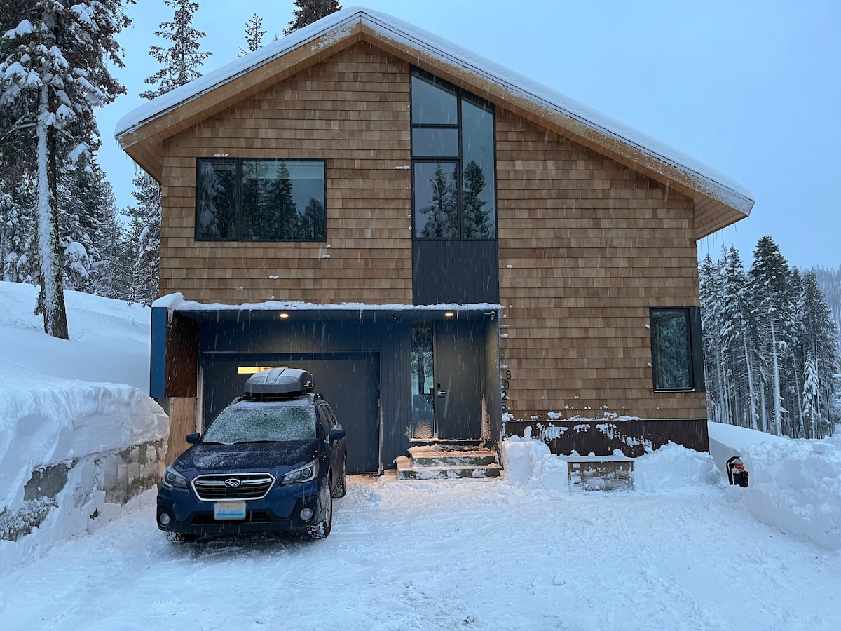 Front of the chalet in the winter snowstorm
