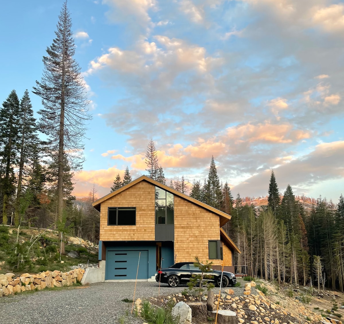 Front of the chalet in summer afternoon.
