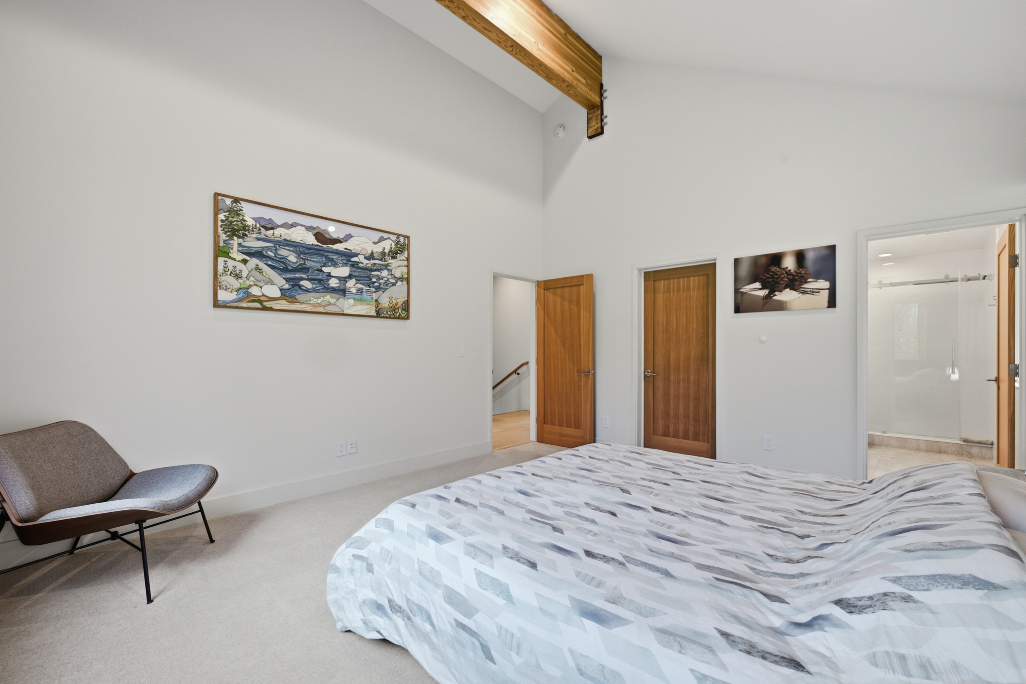 Master bedroom showing walk-in closet and ensuite bathroom door