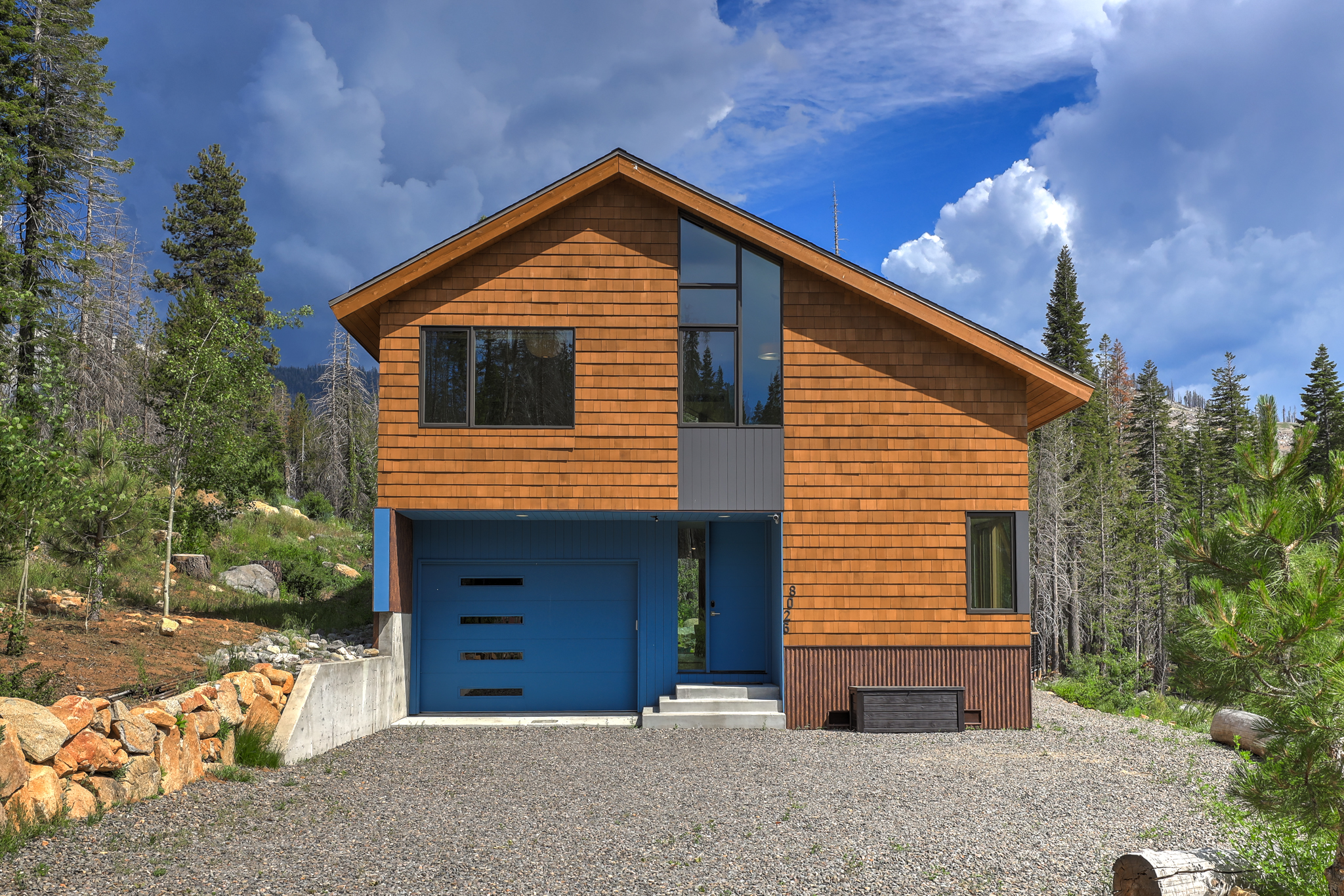 Front facade of the chalet in summer