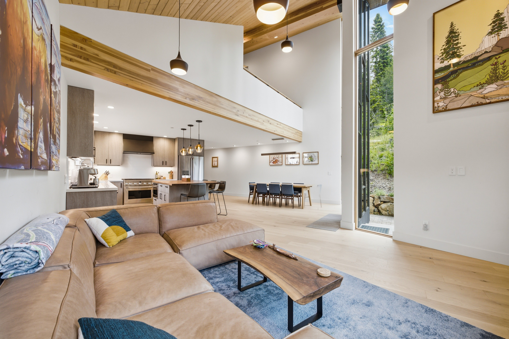Wide open plan with living room, kitchen, and dining area