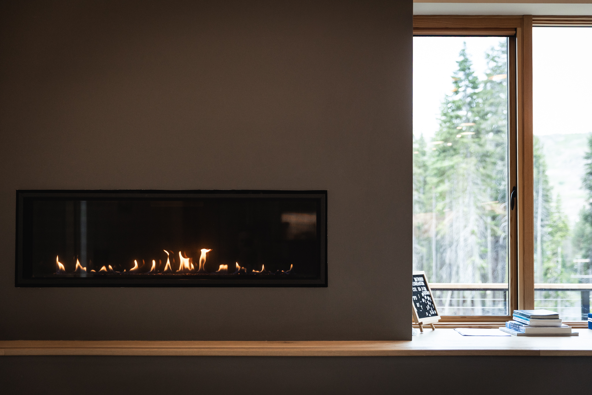 Close-up of linear gas fireplace with flames